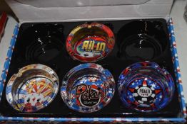 Four Poker glass ashtrays