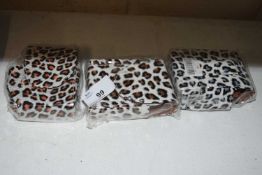 Three leopard print bags