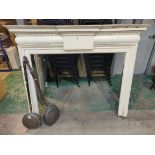 A painted wooden fire surround, a breakfront desig