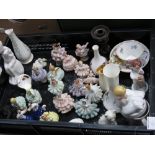 A collection of ceramic figures including two Roya