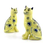 A pair of Galle style pottery cats