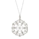 An Edwardian platinum diamond openwork pendant, with chain