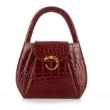 Cartier, an early 90s brown crocodile Panthere handbag,