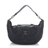 Chanel, a black caviar Half Moon handbag
