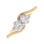 An 18ct gold diamond two-stone crossover ring