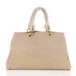 Bottega Veneta, a large beige canvas tote