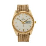 Omega, a 9ct gold automatic day date bracelet watch