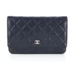 Chanel, a black leather Wallet On Chain handbag