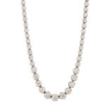 A brilliant-cut diamond riviere necklace