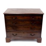 A George III mahogany chest of drawers, circa 1770, moulded top, brushing slide over four long