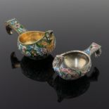 A Russian silver gilt and cloisonne enamel kovsh, with floral pattern on a green ground, stamped St.