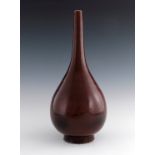 A 19th Century Chinese sang de boeuf glaze bottle vase, extended neck, height 42cm