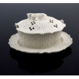 A Staffordshire white saltglaze butter dish cover and stand
