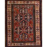 A Caucasian Kazak rug, 234 by 160cm