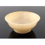 A Chinese pale jade small bowl, gently everted rim, four character incised seal mark to base, height