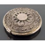 An Oriental silver filigree and niello enamelled compact