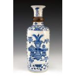 A Chinese blue and white vase, Kangxi, 1662-1722, of cylinder form with a flared opening and bronzed