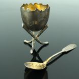 A Finnish novelty silver egg cup and spoon, Suomen Kultaseppa Oy, Turku 1911