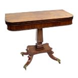 A Regency mahogany tea table, circa 1820, fold-out top, gadroon border, square section baluster
