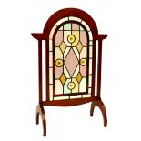 George Walton (attributed), an Arts and Crafts mahogany and stained glass fire screen