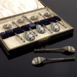 A set of seven Russian silver gilt cloisonne enamel spoons, struck first Kokoshnik and workmaster