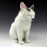 A Japanese Hirado porcelain model of a seated cat, 20th Century, impressed Japan mark, height 24cm