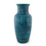 Theodore Deck (attributed), a Chinoiserie blue faience vase, relief moulded in the Persian taste,