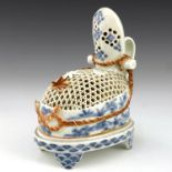 A Japanese Hirado porcelain koro, Meiji period, 1868-1912, in the form of a reticulated nobleman's