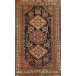 A Persian Qashqai rug, 275 by 147cm