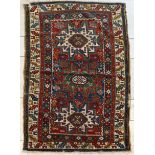 A Caucasian Lesghi rug, 165 by 94cm