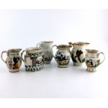 A collection of 19th century relief moulded Prattware jugs