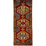 A Turkish Karapinar long rug, 375 by 119cm