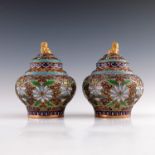 A pair of Japanese gilt metal raised cloisonne covered vases, 20th Century, of ovoid form with