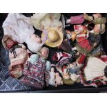 A collection of composite moulded dolls, mainly so