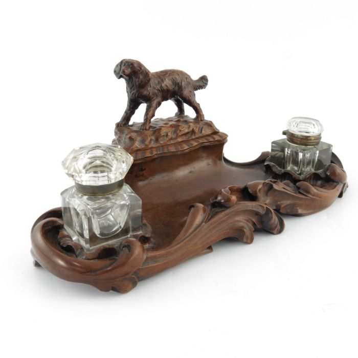 A late 19th Century Black Forest double desk inkwell, of serpentine form with high relief carved - Image 2 of 5