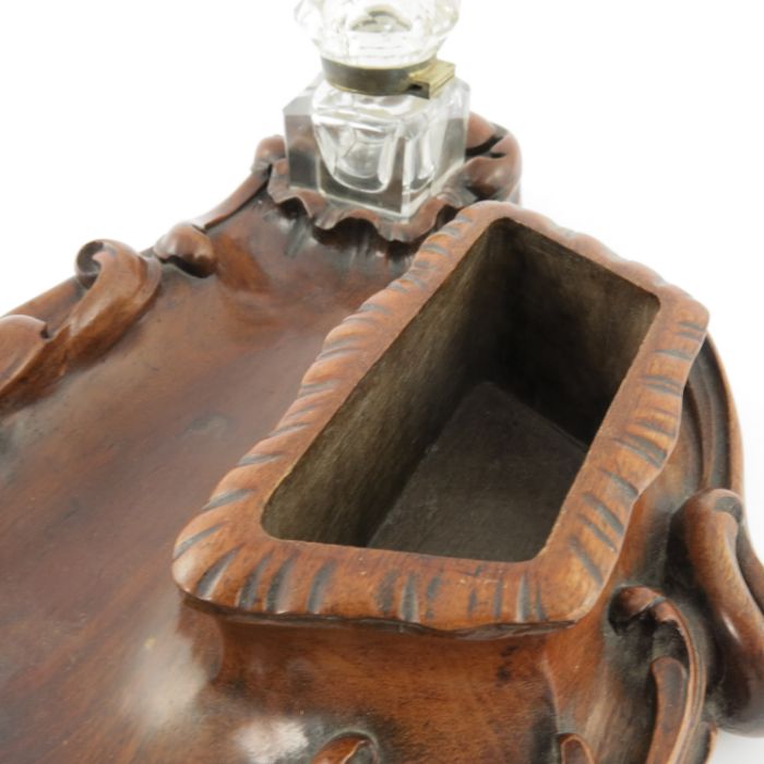 A late 19th Century Black Forest double desk inkwell, of serpentine form with high relief carved - Image 5 of 5