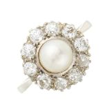 An early 20th century 18ct gold, pearl and diamond cluster ring