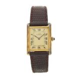 Cartier, a silver gilt Must de Cartier Tank wrist