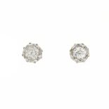 A pair of old-cut diamond single-stone stud earrings
