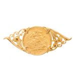 A George V gold half sovereign coin brooch