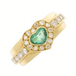 An 18ct gold emerald and diamond dress ring