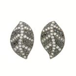 A pair of 18ct gold diamond and black diamond leaf earrings