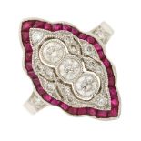 A diamond and ruby marquise-shape dress ring