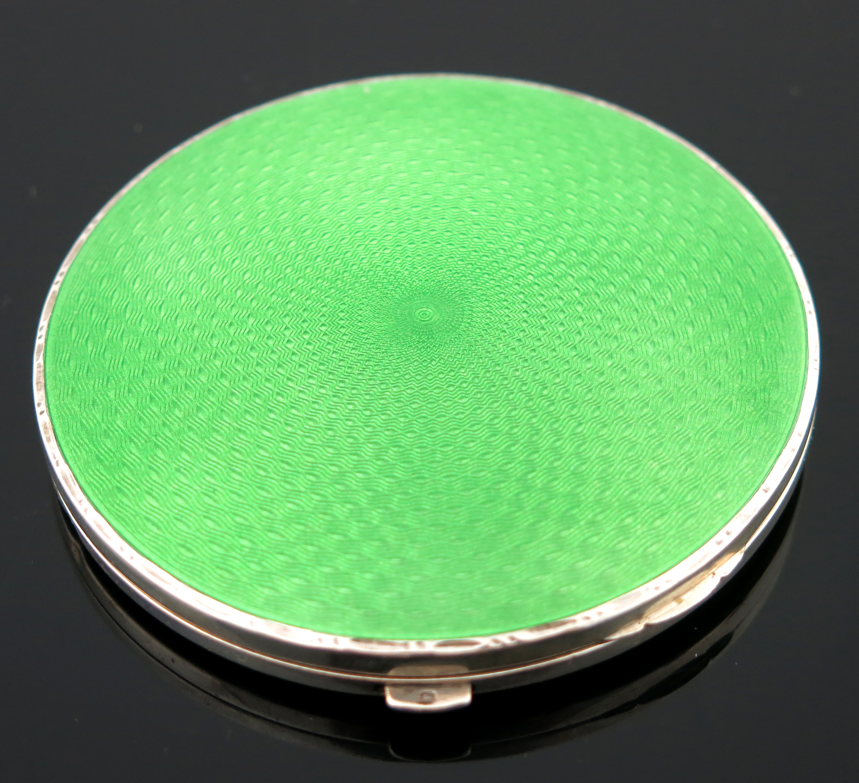 A George V silver and enamelled compact, Bravingtons Ltd., Birmingham 1935