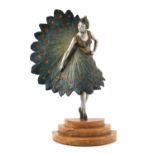 Luce, an Art Deco silvered and cold painted bronze figure, Peacock Dancer