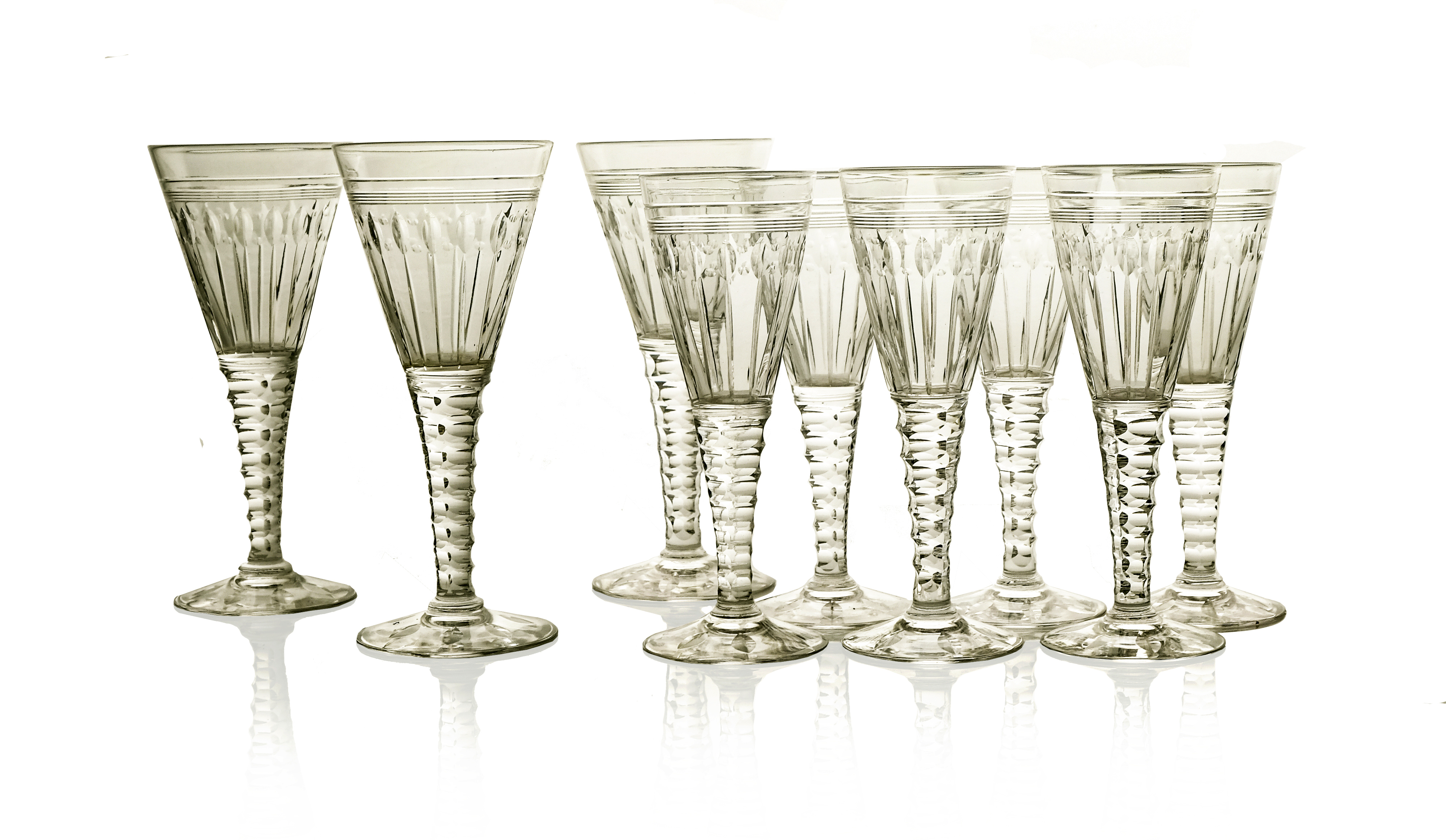 Ludwig Kny for Stuart, a part suite of Oleta Villiers Art Deco cut glass wine glasses