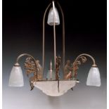 A French Art Deco bronze and glass four branch pendant light