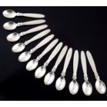Gundorph Albertus for Georg Jensen, a set of twelve silver Cactus coffee spoons