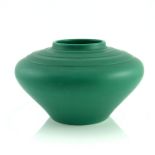 Keith Murray for Wedgwood, a matt green glazed vase