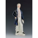 A Staffordshire figure of the Duke of Wellington, circa 1850, modelled standing, wearing a patterned